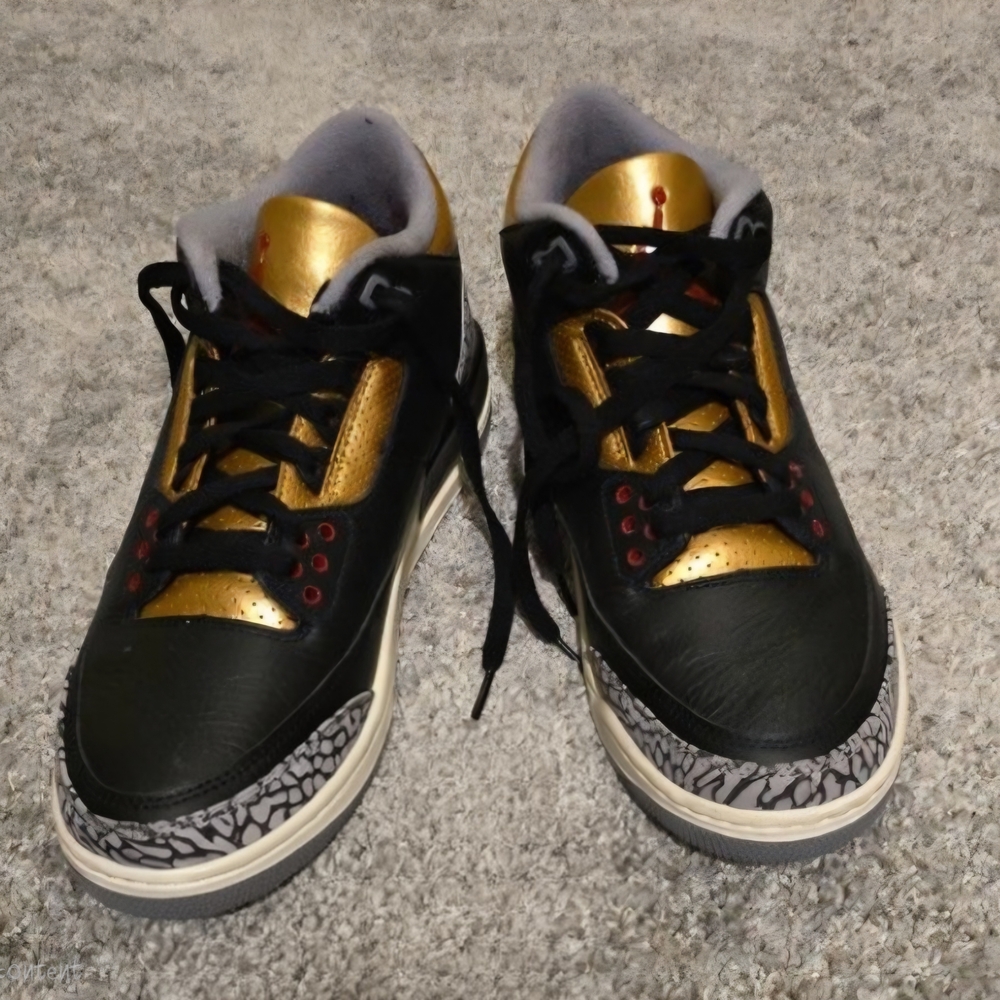 Jordan Black and Gold Sneakers